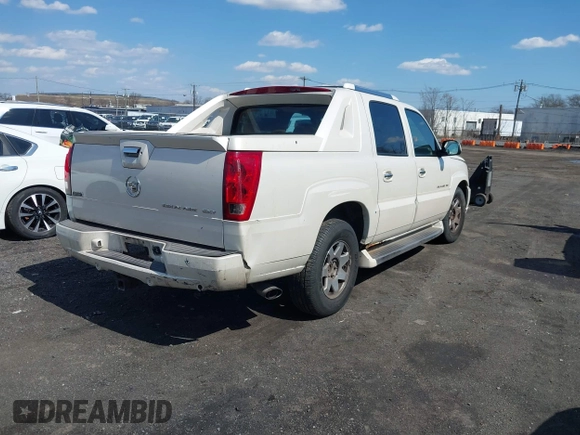 2004 Cadillac Escalade EXT z VIN 3GYEK62N24G294489, wystawiony jako IAAI lot #41887062 z przebiegiem 159 000 mil mil oraz . Historia ofert i sprzedaży dostępna na DreamBid. Obrazek 4.