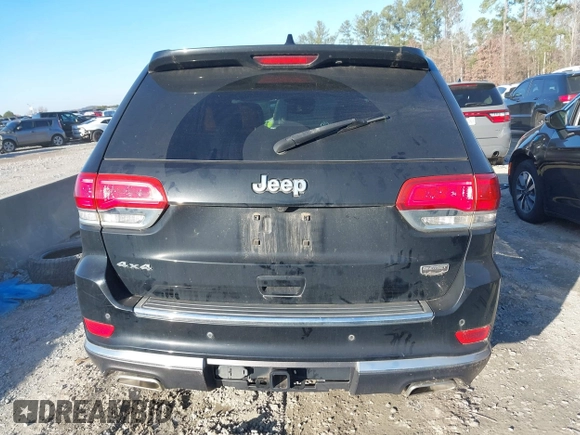 2018 Jeep Grand Cherokee Summit with VIN 1C4RJFJG1JC211047, listed as a IAAI auction lot 41133865 with 66,588 mi miles and . Bid and sale history available at DreamBid. Image 16.
