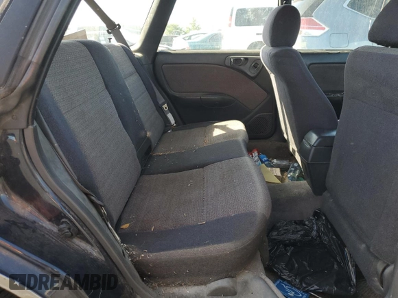 1996 Subaru Legacy with VIN 4S3BG4859T6986223, listed as a Copart auction lot 57683345 with 265,568 mi miles and Salvage title. Bid and sale history available at DreamBid. Image 11.