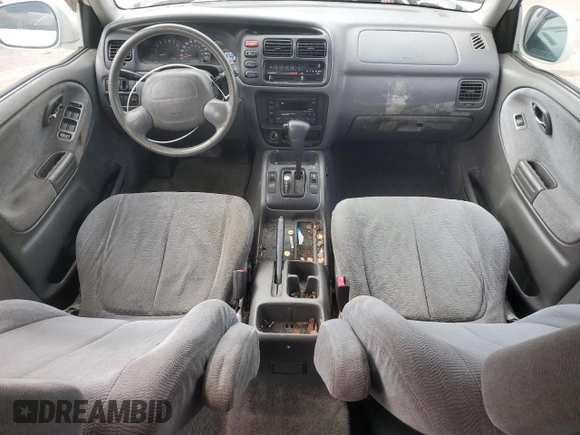 2002 Suzuki XL7 Standard z VIN JS3TY92V024106089, wystawiony jako Copart lot #58418685 z przebiegiem 232 254 mil mil oraz Szkoda całkowita • Salvage title. Historia ofert i sprzedaży dostępna na DreamBid. Obrazek 8.