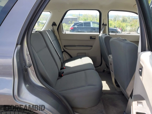 2009 Ford Escape XLS z VIN 1FMCU02709KC11692, wystawiony jako IAAI lot #42202890 z przebiegiem 155 243 mil mil oraz . Historia ofert i sprzedaży dostępna na DreamBid. Obrazek 8.