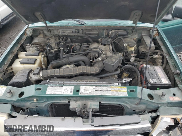 1999 Ford Ranger XL with VIN 1FTYR14V6XPA93323, listed as a Copart auction lot 59769985 with 345,075 mi miles and Salvage title. Bid and sale history available at DreamBid. Image 11.