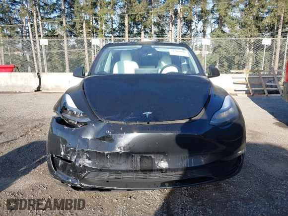 2023 Tesla Model Y Long Range z VIN 7SAYGDEE9PF637042, wystawiony jako IAAI lot #41969086 z przebiegiem 25 524 mil mil oraz . Historia ofert i sprzedaży dostępna na DreamBid. Obrazek 6.