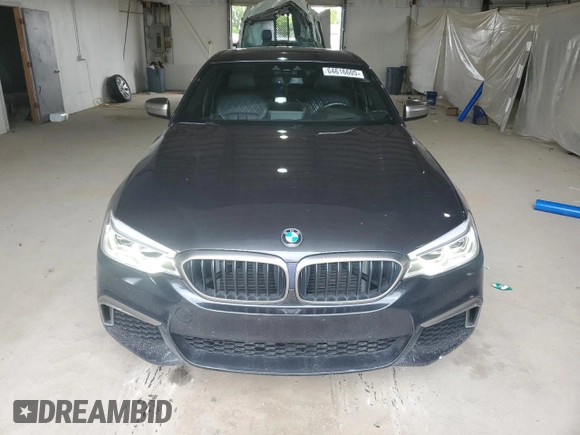 2018 BMW 5 Series M550i xDrive with VIN WBAJB9C58JB035267, listed as a Copart auction lot 64616605 with 125,365 mi miles and Clean title. Bid and sale history available at DreamBid. Image 5.