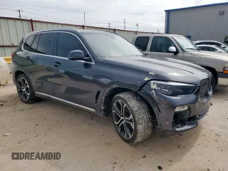 2021 BMW X5 xDrive40i with VIN 5UXCR6C0XM9D81103, listed as a Copart auction lot 54363525 with 95,870 mi miles and Salvage title. Bid and sale history available at DreamBid. Image 4.