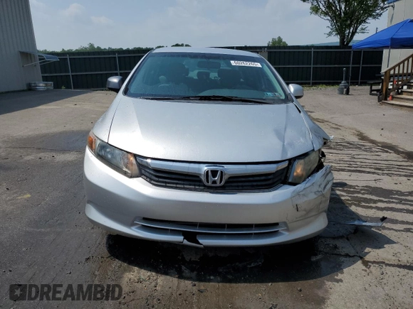 2012 Honda Civic LX с VIN 19XFB2F5XCE348936, выставлен на аукционе Copart как лот 60262265 с пробегом 199 721 миль миль и Списание • Salvage title. История ставок и продаж доступна на DreamBid. Изображение 5.