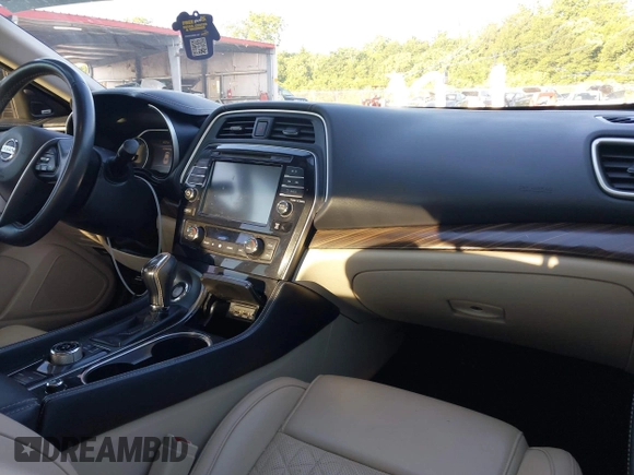 2018 Nissan Maxima SL with VIN 1N4AA6AP3JC401046, listed as a IAAI auction lot 42144400 with 86,330 mi miles and . Bid and sale history available at DreamBid. Image 5.