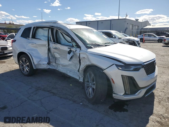 2020 Cadillac XT6 FWD Premium Luxury with VIN 1GYKPCRS8LZ177562, listed as a Copart auction lot 57123195 with Not provided miles and Salvage title. Bid and sale history available at DreamBid. Image 4.