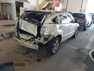 2009 Dodge Caliber SXT with VIN 1B3HB48A89D116734, listed as a IAAI auction lot 41959281 with 209,136 mi miles and . Bid and sale history available at DreamBid. Image 4.