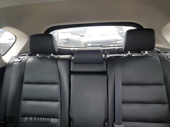 2016 Mazda CX-5 Grand Touring z VIN JM3KE4DY2G0637779, wystawiony jako Copart lot #52001805 z przebiegiem 184 381 mil mil oraz Czysty tytuł • Clean title. Historia ofert i sprzedaży dostępna na DreamBid. Obrazek 10.