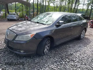 2012 Buick LaCrosse Premium 3 z VIN 1G4GH5E31CF310937, wystawiony jako IAAI lot #42092530 z przebiegiem 165 295 mil mil oraz . Historia ofert i sprzedaży dostępna na DreamBid. Obrazek 17.