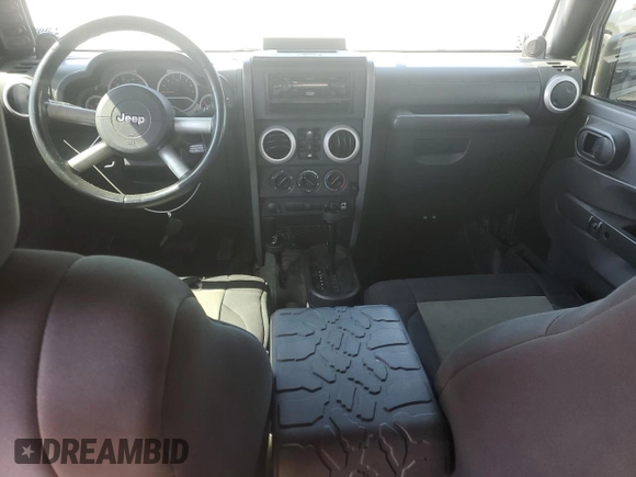 2008 Jeep Wrangler Unlimited Sahara with VIN 1J4GA59158L550576, listed as a Copart auction lot 53095565 with 208,434 mi miles and Salvage Title. Bid and sale history available at DreamBid. Image 8.