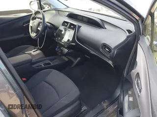 2016 Toyota Prius Four z VIN JTDKARFU2G3022031, wystawiony jako IAAI lot #41631802 z przebiegiem 151 389 mil mil oraz . Historia ofert i sprzedaży dostępna na DreamBid. Obrazek 5.