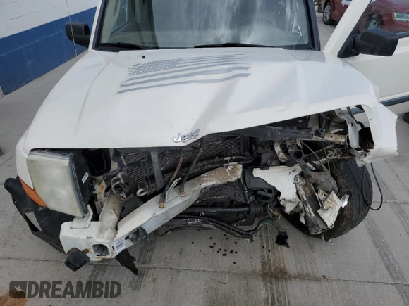 2008 Jeep Commander Sport with VIN 1J8HG48K68C111330, listed as a Copart auction lot 54011375 with 207,641 mi miles and Salvage title. Bid and sale history available at DreamBid. Image 12.