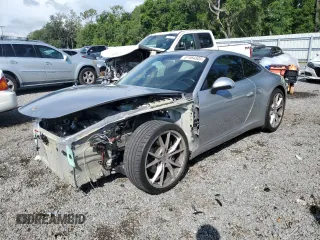 2017 Porsche 911 Carrera with VIN WP0AA2A99HS106537, listed as a Copart auction lot 61464305 with 63,078 mi miles and Salvage title. Bid and sale history available at DreamBid. Image 1.