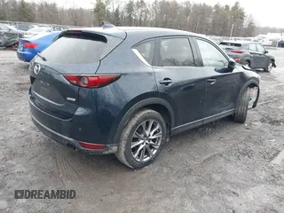 2019 Mazda CX-5 Signature with VIN JM3KFBEY4K0525171, listed as a IAAI auction lot 41706635 with 88,293 mi miles. Bid and sale history available at carsss.com. Image 4.