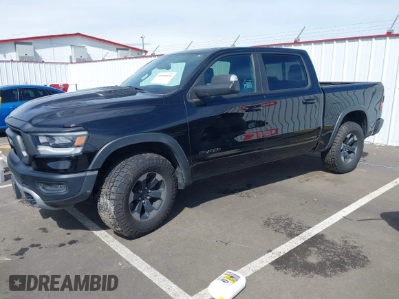 2019 Ram 1500 Rebel with VIN 1C6SRFLT2KN592652, listed as a IAAI auction lot 41989054 with 71,630 mi miles and . Bid and sale history available at DreamBid. Image 17.