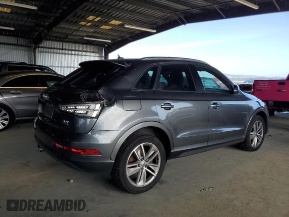 2018 Audi Q3 Premium with VIN WA1ECCFS1JR007540, listed as a Copart auction lot 62449775 with 118,766 mi miles and Salvage title. Bid and sale history available at DreamBid. Image 3.