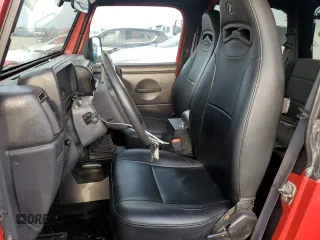 1999 Jeep Wrangler SE with VIN 1J4FY29P7XP410255, listed as a Copart auction lot 47207675 with 181,946 mi miles and Salvage Title. Bid and sale history available at carsss.com. Image 7.