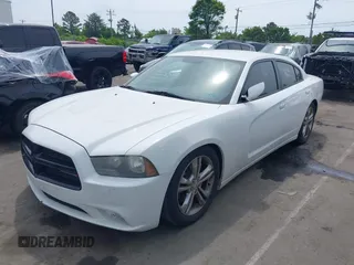 2013 Dodge Charger SE with VIN 2C3CDXFG7DH568461, listed as a IAAI auction lot 42025979 with 187,076 mi miles and . Bid and sale history available at carsss.com. Image 2.