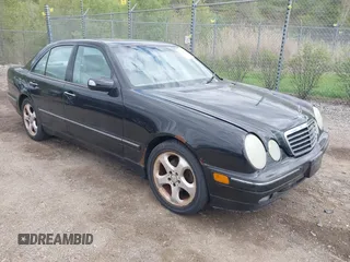 2002 Mercedes-Benz E-Class with VIN WDBJF65J52B496832, listed as a IAAI auction lot 42202331 with 156,304 mi miles. Bid and sale history available at carsss.com. Image 1.