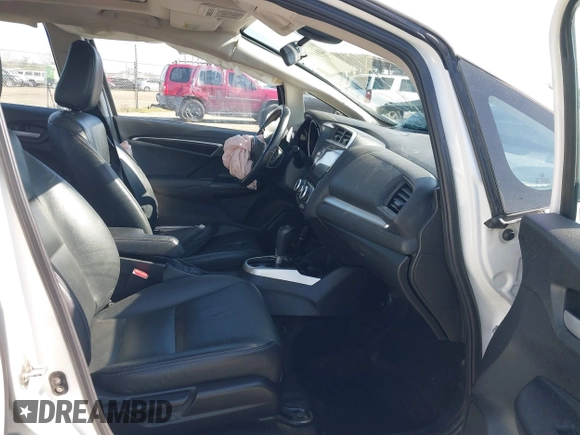 2018 Honda Fit EX-L with VIN 3HGGK5H90JM727180, listed as a IAAI auction lot 41610155 with 180,020 mi miles. Bid and sale history available at carsss.com. Image 5.
