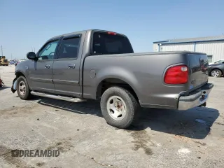 2003 Ford F-150 XLT with VIN 1FTRW07663KA63497, listed as a Copart auction lot 51658115 with 269,633 mi miles and Salvage Title. Bid and sale history available at carsss.com. Image 2.