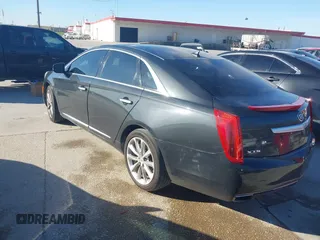 2013 Cadillac XTS Luxury with VIN 2G61R5S38D9110582, listed as a IAAI auction lot 41859720 with 92,744 mi miles. Bid and sale history available at carsss.com. Image 3.