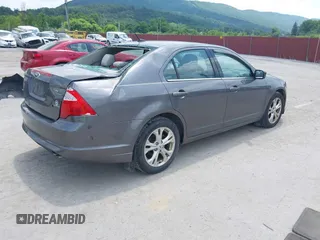 2012 Ford Fusion SE with VIN 3FAHP0HA8CR155501, listed as a IAAI auction lot 42593452 with 145,269 mi miles and . Bid and sale history available at DreamBid. Image 4.