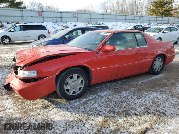 2002 Cadillac Eldorado z VIN 1G6EC12972B106132, wystawiony jako Copart lot #86799624 z przebiegiem 75 334 mil mil oraz Szkoda całkowita • Salvage title. Historia ofert i sprzedaży dostępna na DreamBid. Obrazek 1.