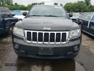2011 Jeep Grand Cherokee Laredo with VIN 1J4RR4GG1BC737808, listed as a Copart auction lot 61305565 with 188,067 mi miles and Clean title. Bid and sale history available at DreamBid. Image 5.