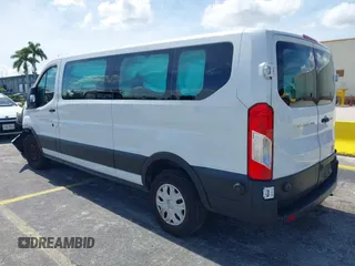 2020 Ford Transit Passenger XL with VIN 1FBAX2Y80LKA42137, listed as a IAAI auction lot 42802902 with 59,540 mi miles and . Bid and sale history available at DreamBid. Image 3.