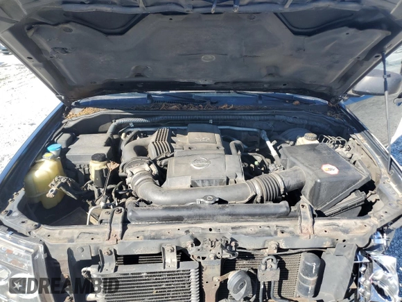 2005 Nissan Frontier LE z VIN 1N6AD07U95C401972, wystawiony jako Copart lot #48394485 z przebiegiem 302 912 mil mil oraz Szkoda całkowita • Salvage title. Historia ofert i sprzedaży dostępna na DreamBid. Obrazek 11.