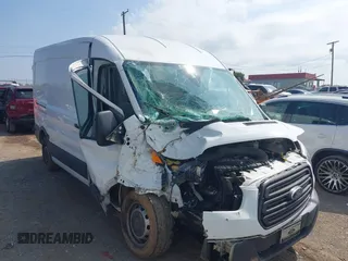 2016 Ford Transit Cargo z VIN 1FTYR2CM6GKA55411, wystawiony jako IAAI lot #42582896 z przebiegiem 89 921 mil mil oraz . Historia ofert i sprzedaży dostępna na DreamBid. Obrazek 6.