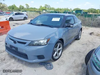 2012 Scion tC with VIN JTKJF5C79C3043661, listed as a IAAI auction lot 42020903 with 184,891 mi miles. Bid and sale history available at carsss.com. Image 2.
