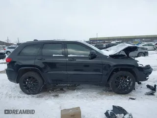 2018 Jeep Grand Cherokee Laredo E with VIN 1C4RJFAG0JC203148, listed as a IAAI auction lot 41614678 with 118,500 mi miles. Bid and sale history available at carsss.com. Image 14.