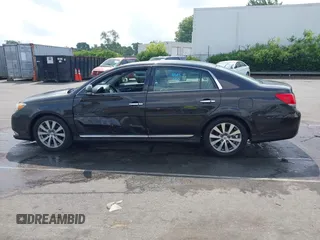 2012 Toyota Avalon with VIN 4T1BK3DB8CU458894, listed as a IAAI auction lot 42414799 with 163,212 mi miles and . Bid and sale history available at DreamBid. Image 14.