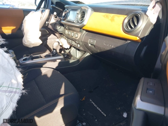 2019 Toyota Tacoma 4WD SR5 with VIN 3TMDZ5BN1KM060088, listed as a IAAI auction lot 41804525 with 69,893 mi miles. Bid and sale history available at carsss.com. Image 5.