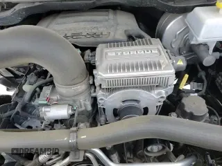 2023 Ram 1500 Rebel with VIN 1C6SRFLT4PN654186, listed as a Copart auction lot 61942985 with 38,771 mi miles and Salvage title. Bid and sale history available at DreamBid. Image 14.