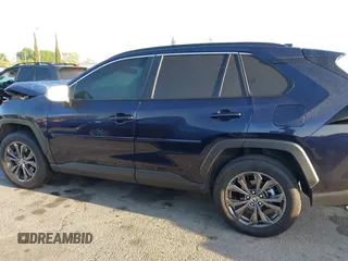 2024 Toyota RAV4 Hybrid XLE Premium with VIN JTMB6RFV0RD141316, listed as a IAAI auction lot 41980384 with 13,270 mi miles and . Bid and sale history available at DreamBid. Image 14.