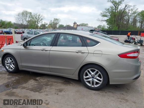 2015 Ford Fusion SE z VIN 3FA6P0H74FR127436, wystawiony jako IAAI lot #42040853 z przebiegiem 164 170 mil mil oraz . Historia ofert i sprzedaży dostępna na DreamBid. Obrazek 14.