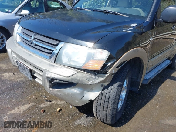 2002 Mitsubishi Montero XLS z VIN JA4MW31R52J070132, wystawiony jako IAAI lot #41782522 z przebiegiem 92 575 mil mil oraz . Historia ofert i sprzedaży dostępna na DreamBid. Obrazek 6.