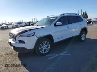 2015 Jeep Cherokee Latitude with VIN 1C4PJLCB9FW517961, listed as a Copart auction lot 41795735 with 131,089 mi miles and Salvage Title. Bid and sale history available at carsss.com. Image 1.