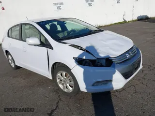 2010 Honda Insight EX with VIN JHMZE2H7XAS015986, listed as a IAAI auction lot 41229343 with 137276 miles. Bid and sale history available at carsss.com. Image 1.