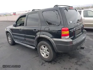 2006 Ford Escape XLT with VIN 1FMYU03156KA42961, listed as a IAAI auction lot 41820423 with 168,212 mi miles. Bid and sale history available at carsss.com. Image 3.