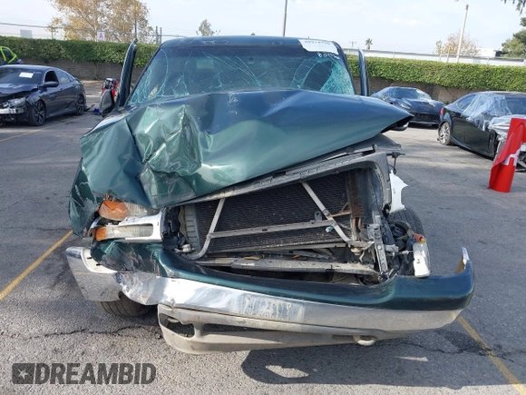 2002 GMC Sierra 1500 SLE z VIN 2GTEC19V121150546, wystawiony jako IAAI lot #40974798 z przebiegiem Nie podano mil oraz . Historia ofert i sprzedaży dostępna na DreamBid. Obrazek 12.
