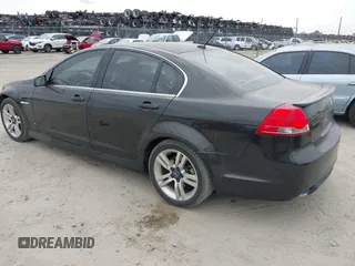 2009 Pontiac G8 with VIN 6G2ER57789L232134, listed as a IAAI auction lot 41864803 with 166,717 mi miles. Bid and sale history available at carsss.com. Image 3.