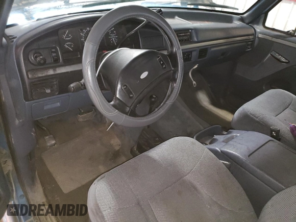 1993 Ford F-150 with VIN 1FTEX14N2PKB50753, listed as a Copart auction lot 61099185 with 144,074 mi miles and Salvage title. Bid and sale history available at DreamBid. Image 8.
