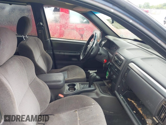 2001 Jeep Grand Cherokee Laredo z VIN 1J4GW48S91C698189, wystawiony jako IAAI lot #42315702 z przebiegiem 229 161 mil mil oraz . Historia ofert i sprzedaży dostępna na DreamBid. Obrazek 5.