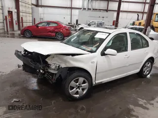 2004 Volkswagen Jetta GLS z VIN 3VWSK69MX4M078023, wystawiony jako IAAI lot #41198138 z przebiegiem 153 830 mil mil oraz . Historia ofert i sprzedaży dostępna na DreamBid. Obrazek 18.